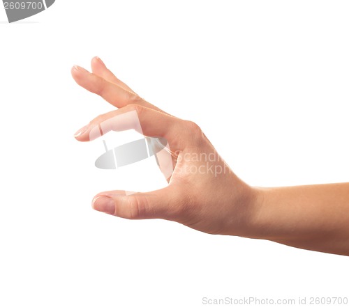 Image of Human hand keeping something with two fingers