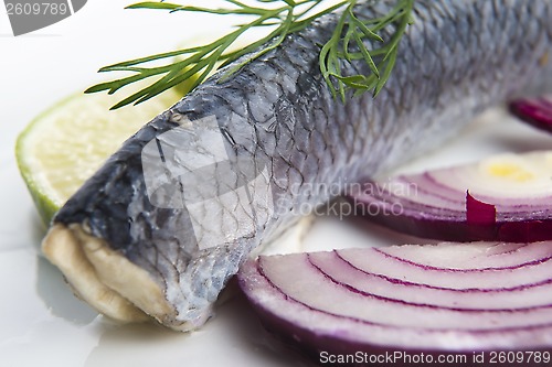 Image of Fillet herring with onion and lemon