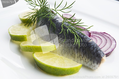 Image of Fillet herring with onion and lemon