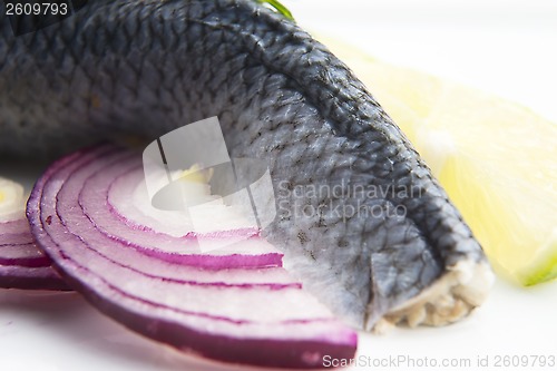 Image of Fillet herring with onion and lemon