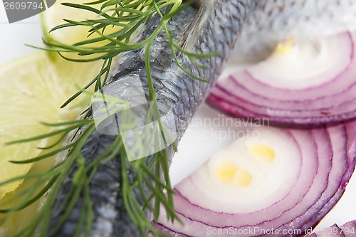 Image of Fillet herring with onion and lemon