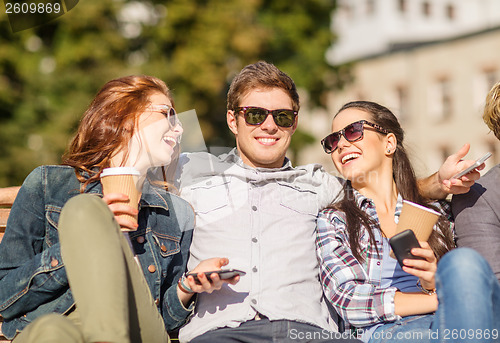 Image of group of students or teenagers with smartphones