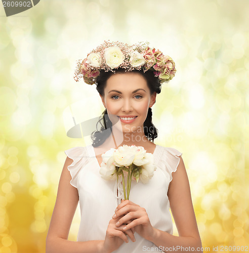 Image of woman wearing wreath of flowers