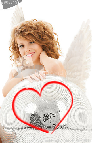 Image of happy teenage angel girl with disco ball