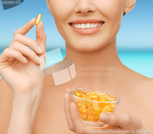Image of beautiful woman with omega 3 vitamins