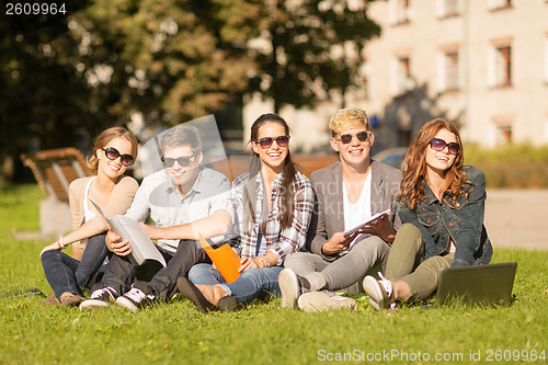 Image of students or teenagers with laptop computers