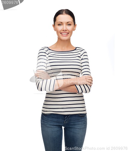 Image of smiling girl in casual clother with crossed arms