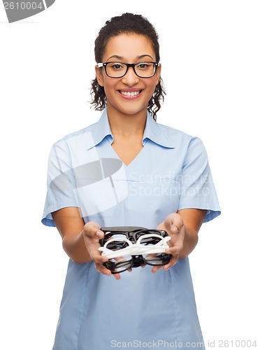 Image of smiling female african-american doctor or nurse