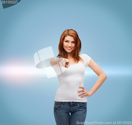 Image of teenager in blank white t-shirt pointing at you