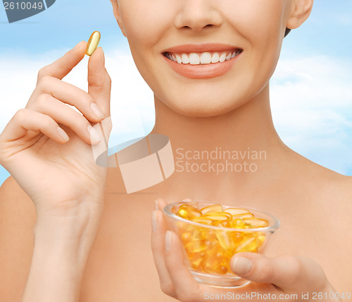 Image of beautiful woman with omega 3 vitamins