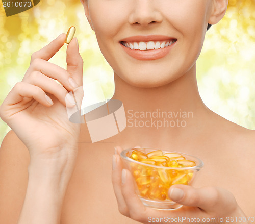 Image of beautiful woman with omega 3 vitamins