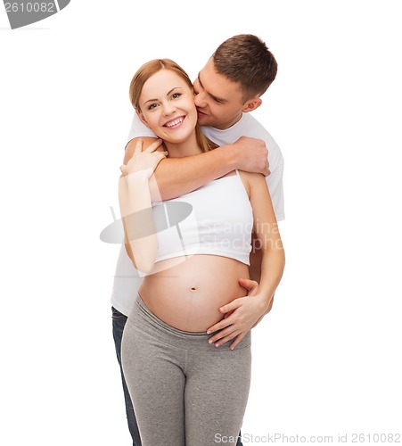 Image of happy young family expecting child