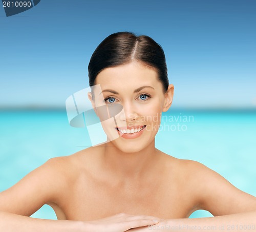 Image of face and hands of beautiful woman