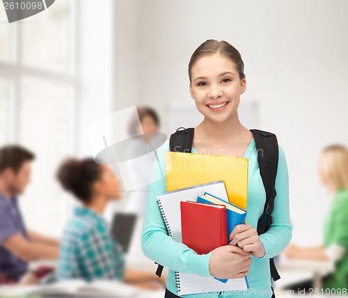 Image of happy and smiling teenage girl