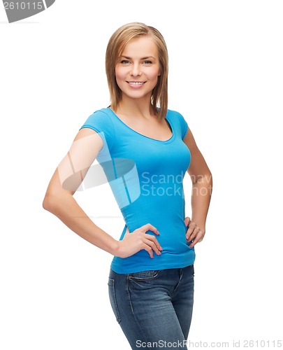 Image of smiling girl in blank blue t-shirt