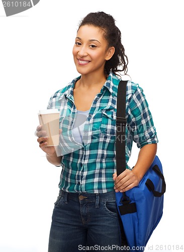 Image of smiling student with bag and take away coffee cup