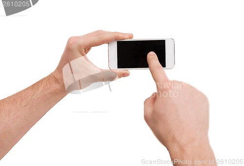 Image of closeup of man hands touching screen of smartphone