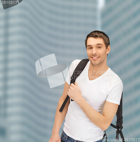 Image of travelling student with backpack outdoor