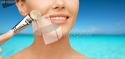 Image of beautiful woman with brush