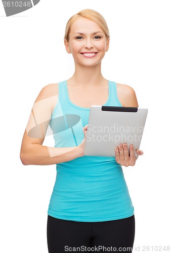 Image of sporty woman with tablet pc