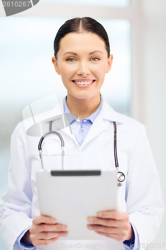 Image of young doctor with tablet pc and sthethoscope