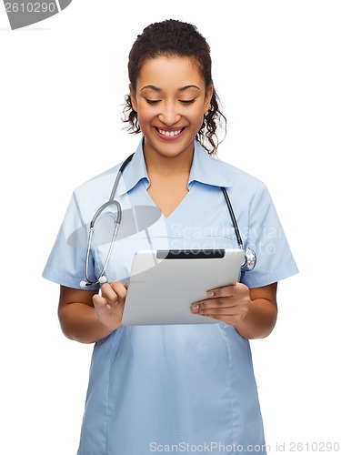 Image of doctor or nurse with stethoscope and tablet pc