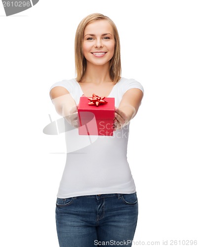 Image of smiling girl with gift box