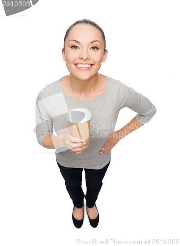 Image of smiling asian woman with take away coffee cup