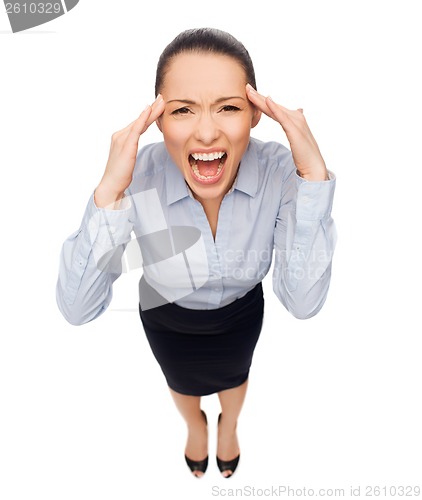 Image of frightened businesswoman screaming