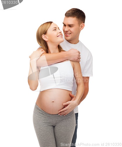 Image of happy young family expecting child