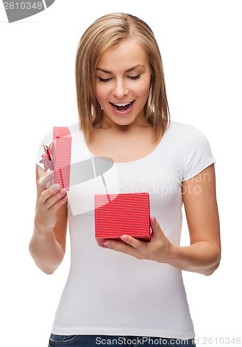 Image of smiling girl with gift box