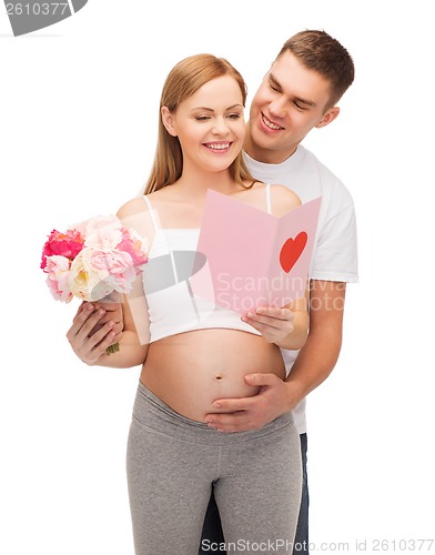 Image of happy young family expecting child