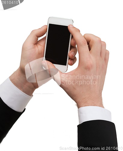 Image of businessman touching screen of smartphone