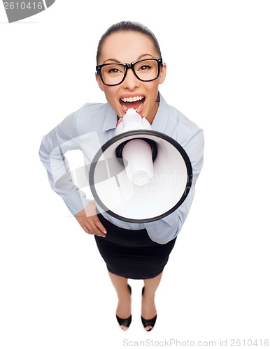 Image of screaming businesswoman with megaphone