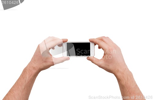 Image of close up of man hands holding smartphone