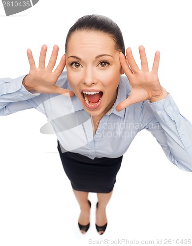 Image of frightened businesswoman screaming