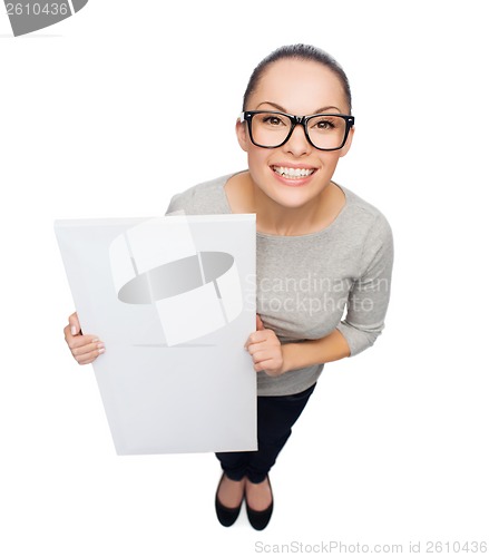 Image of asian woman in eyeglasses with white blank board