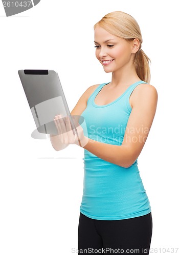 Image of sporty woman with tablet pc