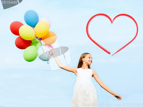 Image of happy girl with colorful balloons