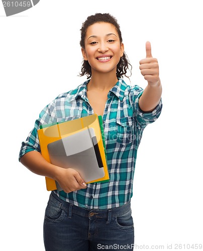 Image of smiling african-american student showing thumbs up