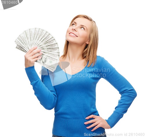 Image of smiling girl with dollar cash money