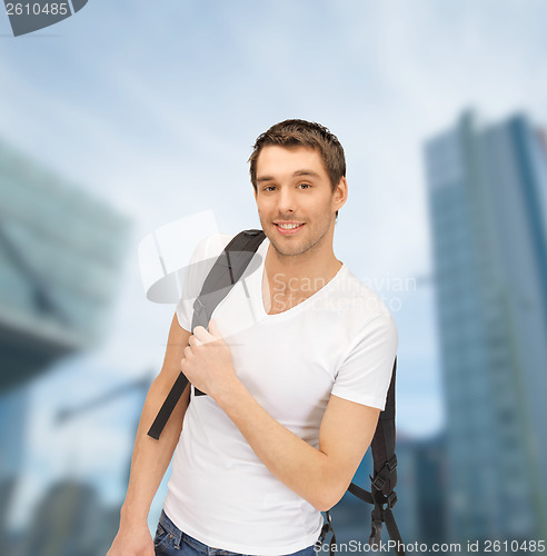 Image of travelling student with backpack outdoor