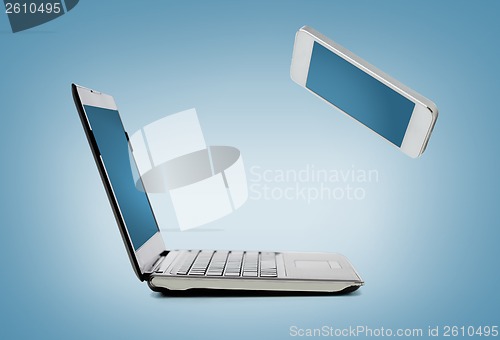 Image of smartphone and laptop conncecting