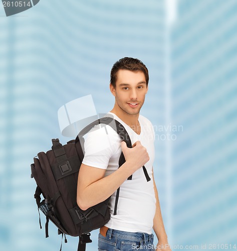 Image of travelling student with backpack outdoor