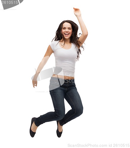 Image of teenage girl in white blank t-shirt jumping