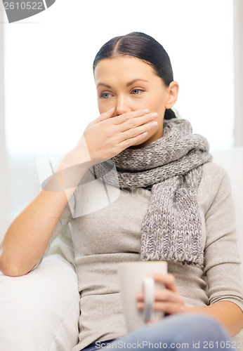 Image of ill woman with flu at home