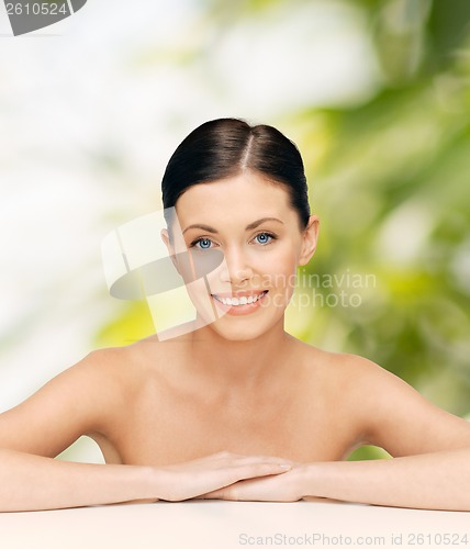 Image of face and hands of beautiful woman