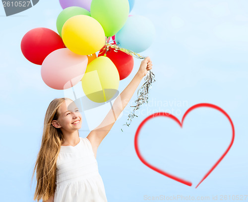 Image of happy girl with colorful balloons