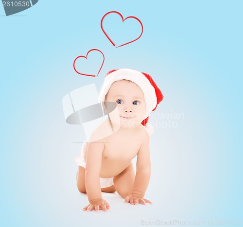 Image of cute baby in santa helper hat