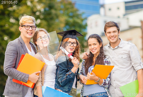 Image of students or teenagers with files and diploma